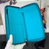 LV light blue (embossed) zippy wallet card holder wallet