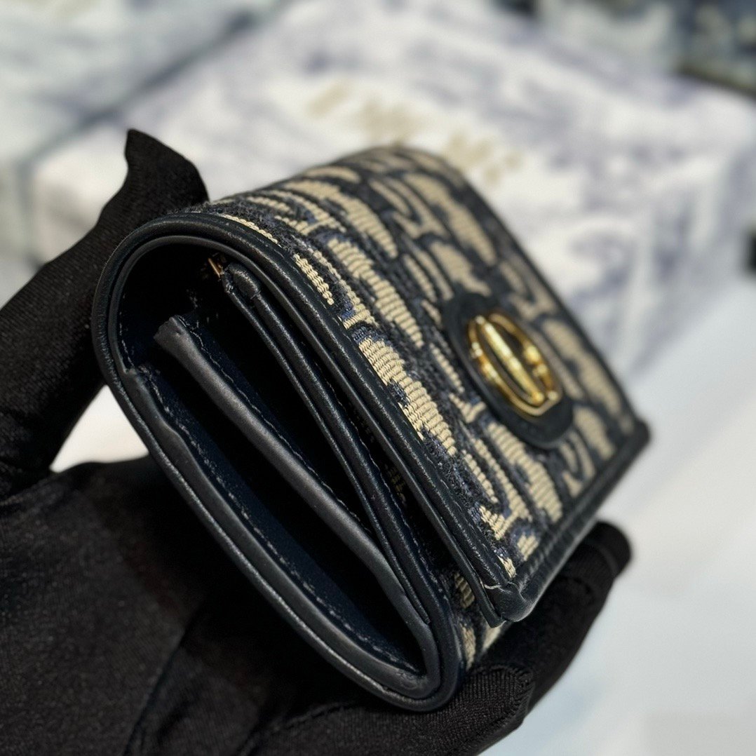 montaigne glycine wallet in blue oblique print fabric