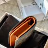 Triomphe compact wallet in shiny calfskin brown monogram