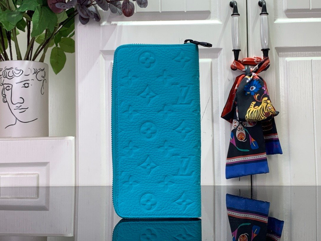 LV light blue (embossed) zippy wallet card holder wallet