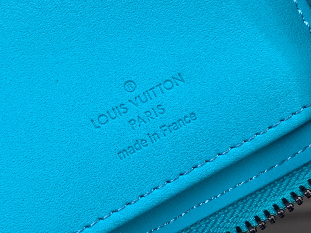 LV light blue (embossed) zippy wallet card holder wallet