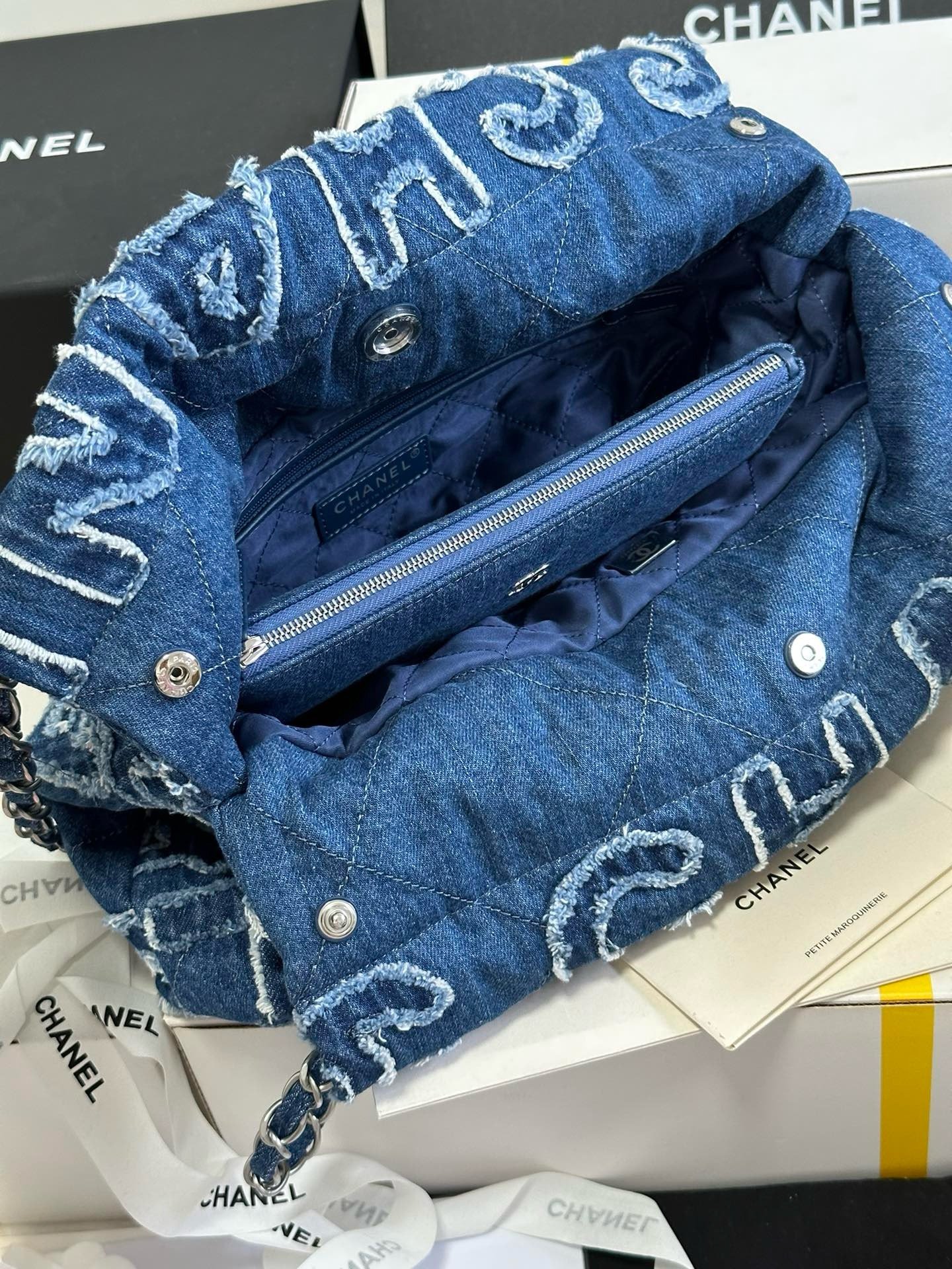 Chanel 24A 22Bag medium denim garbage bag AS3261W1080
