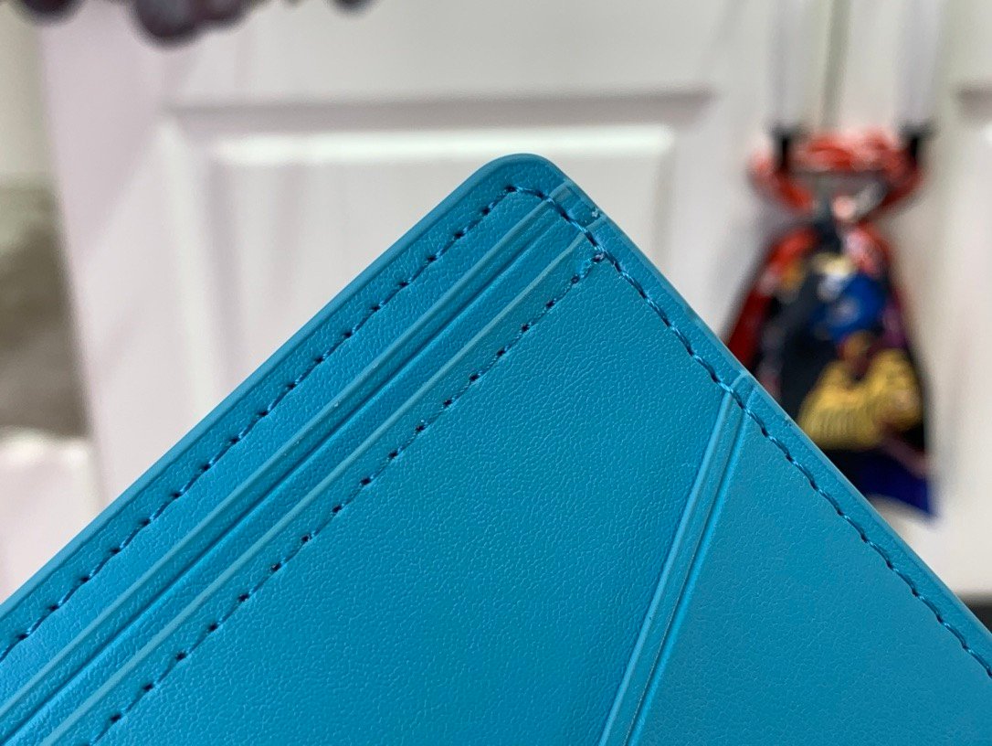 LV [Multiple short wallet] light blue (embossed)