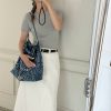 Chanel 24A 22Bag medium denim garbage bag AS3261W1080
