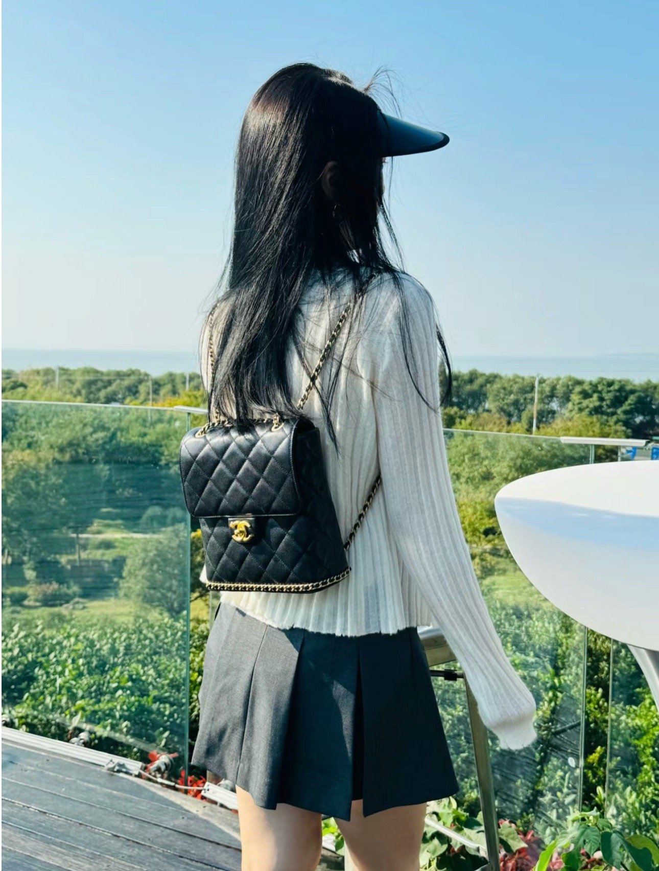 Chanel 23K litchi leather ball pattern chain backpack AS4490W1080