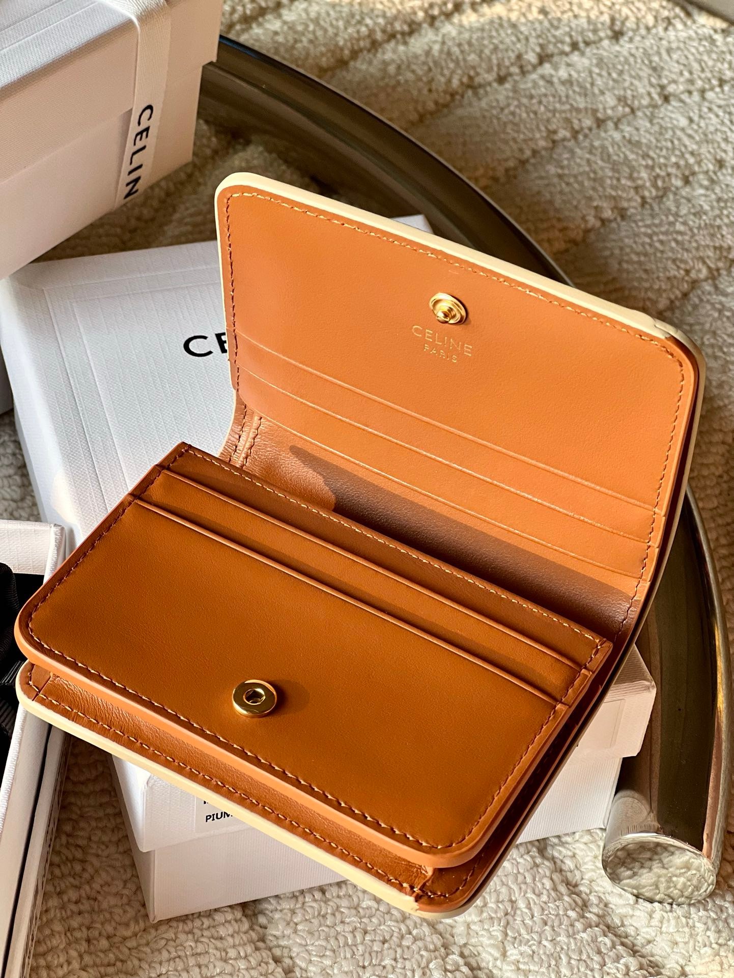 Triomphe compact wallet in shiny calfskin