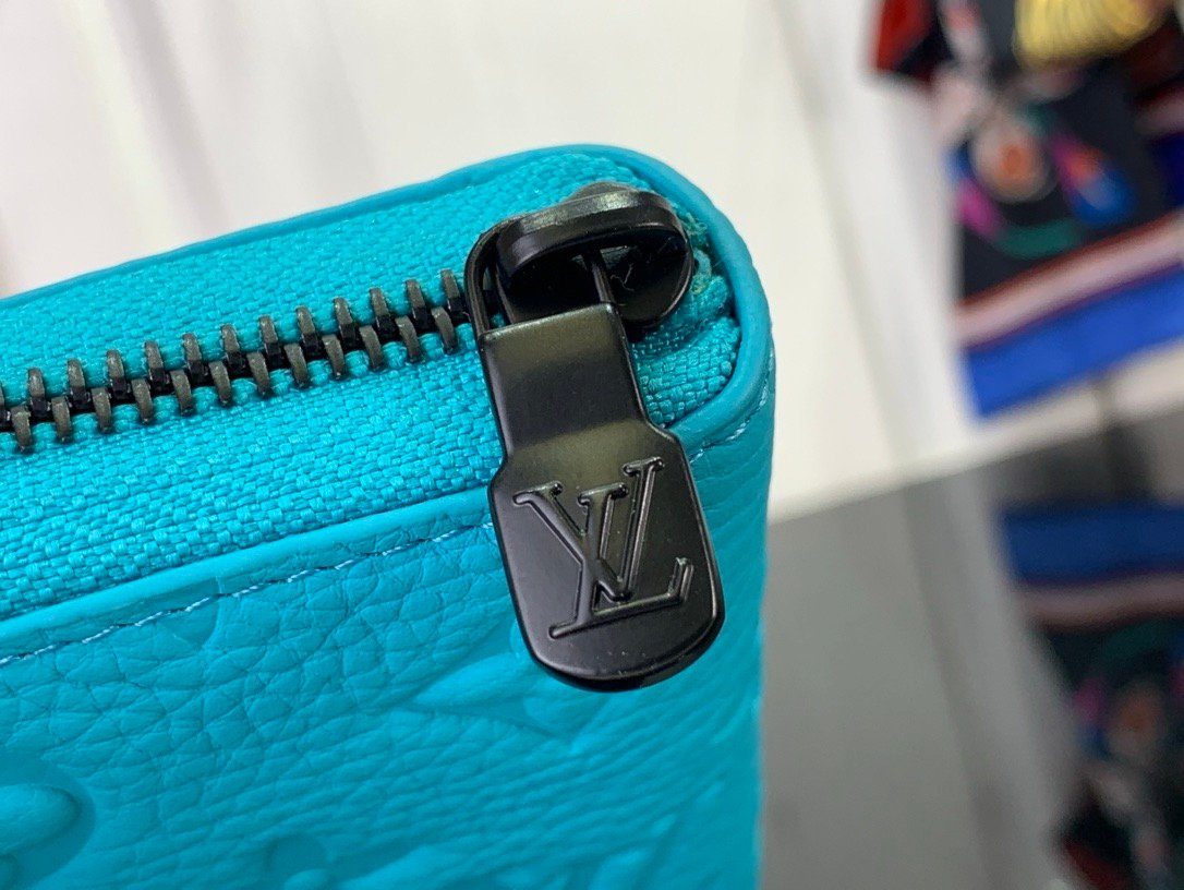 LV light blue (embossed) zippy wallet card holder wallet