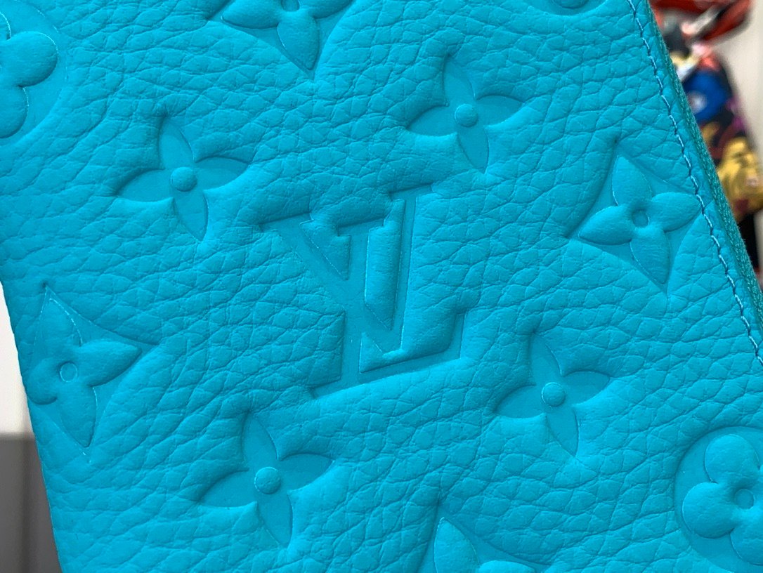 LV light blue (embossed) zippy wallet card holder wallet