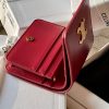 triomphe compact wallet in shiny calfskin Claret