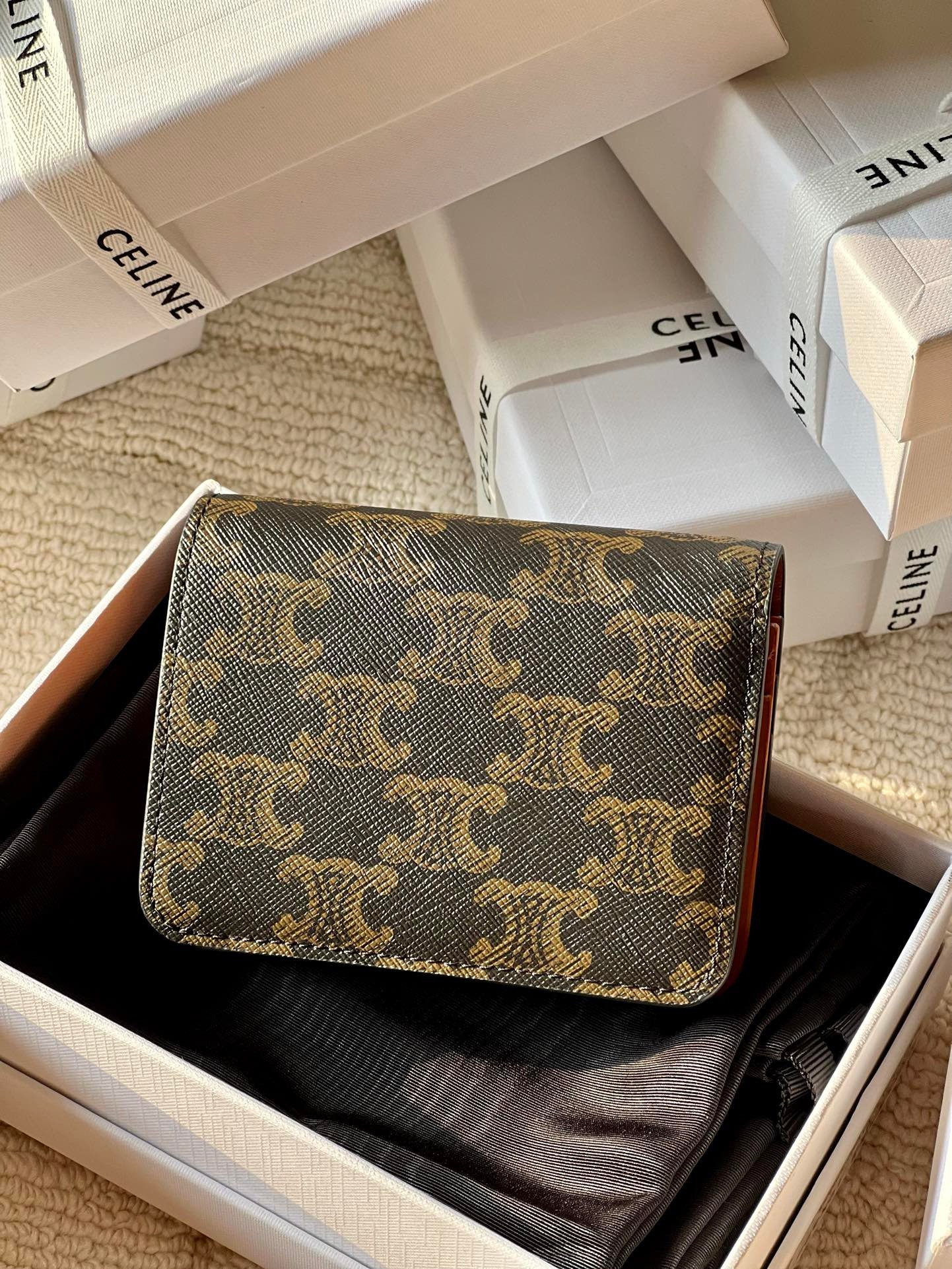 Triomphe compact wallet in shiny calfskin brown monogram