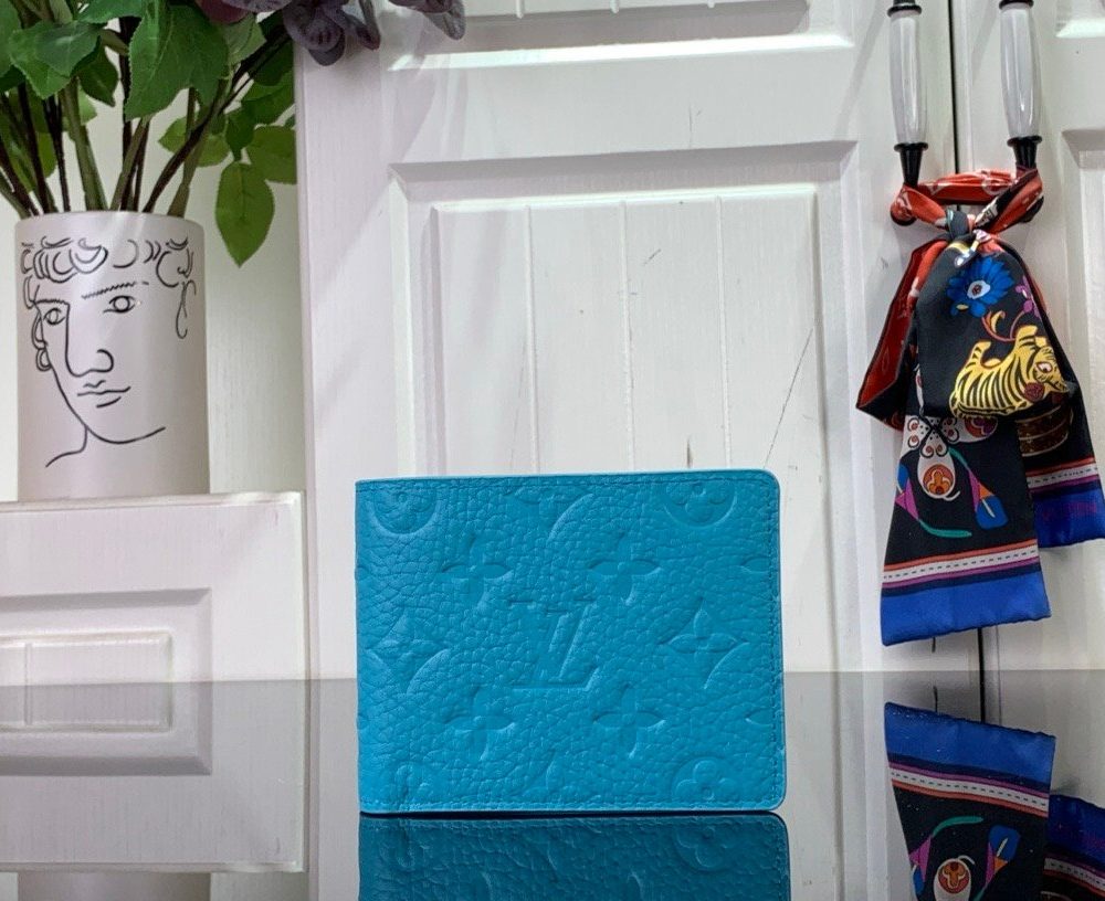 LV [Multiple short wallet] light blue (embossed)