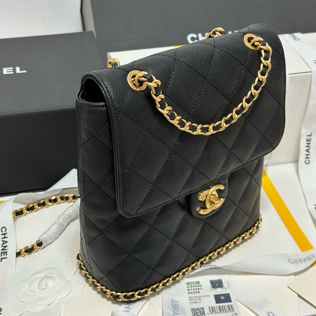 Chanel 23K litchi leather ball pattern chain backpack AS4490W1080