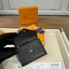 LV embossed wallet card holder