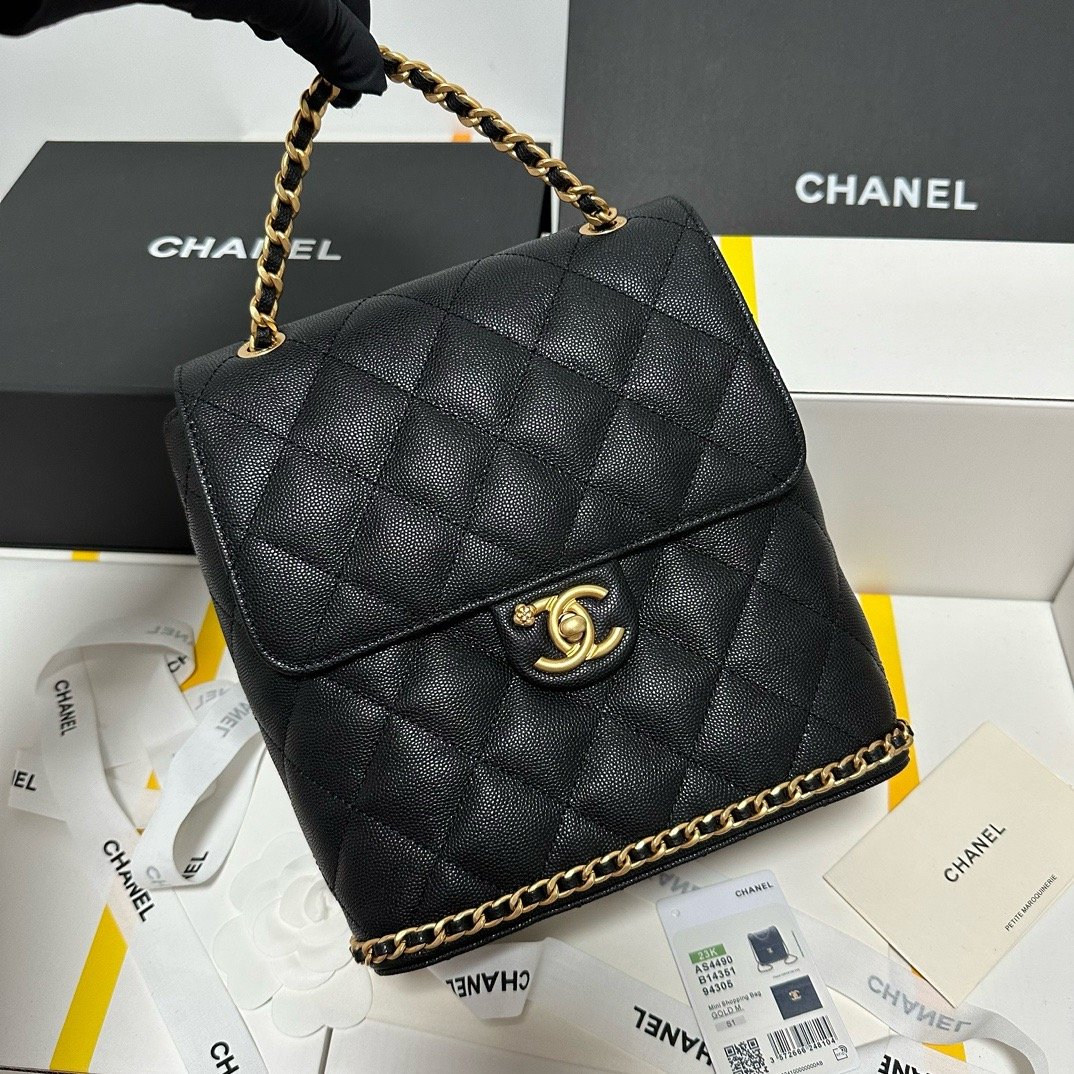 Chanel 23K litchi leather ball pattern chain backpack AS4490W1080