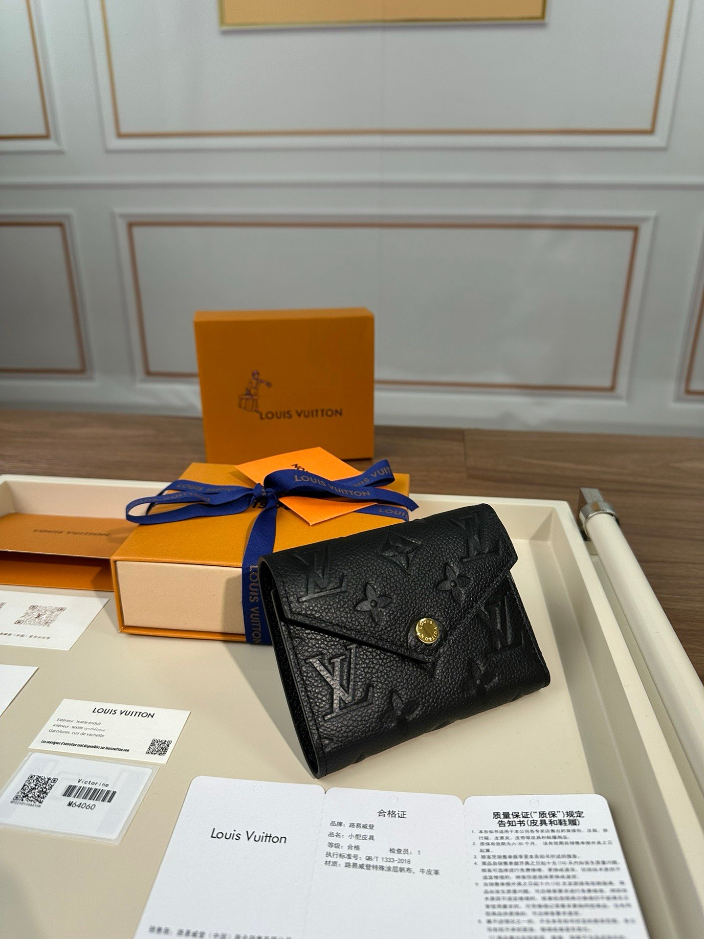 LV embossed wallet card holder