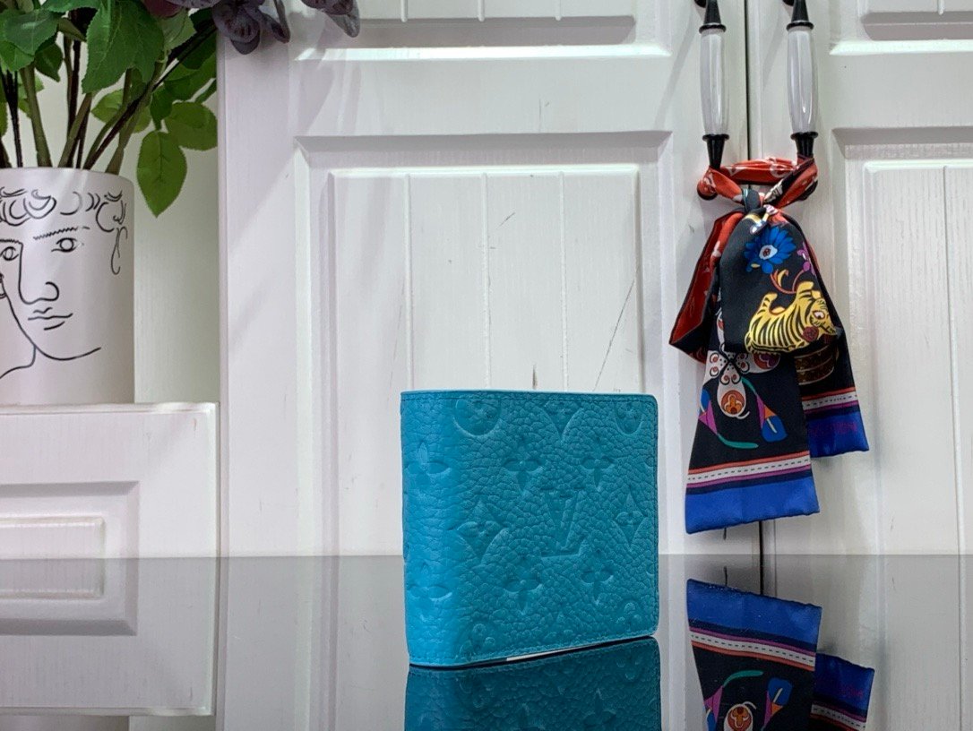 LV [Multiple short wallet] light blue (embossed)