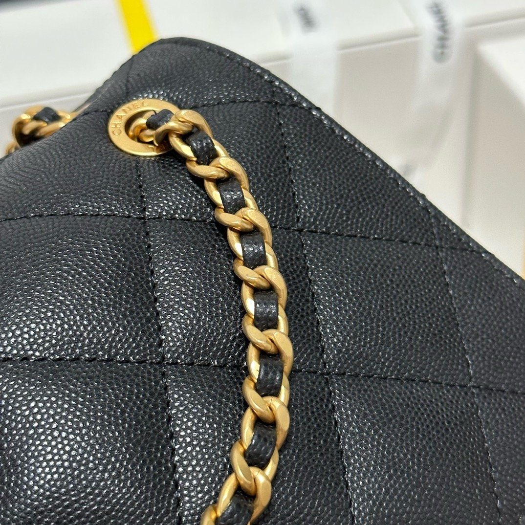 Chanel 23K litchi leather ball pattern chain backpack AS4490W1080
