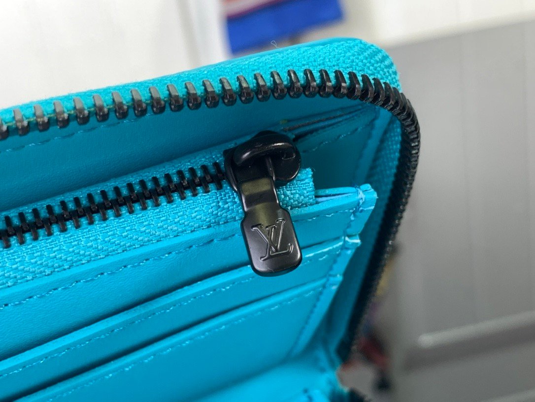 LV light blue (embossed) zippy wallet card holder wallet