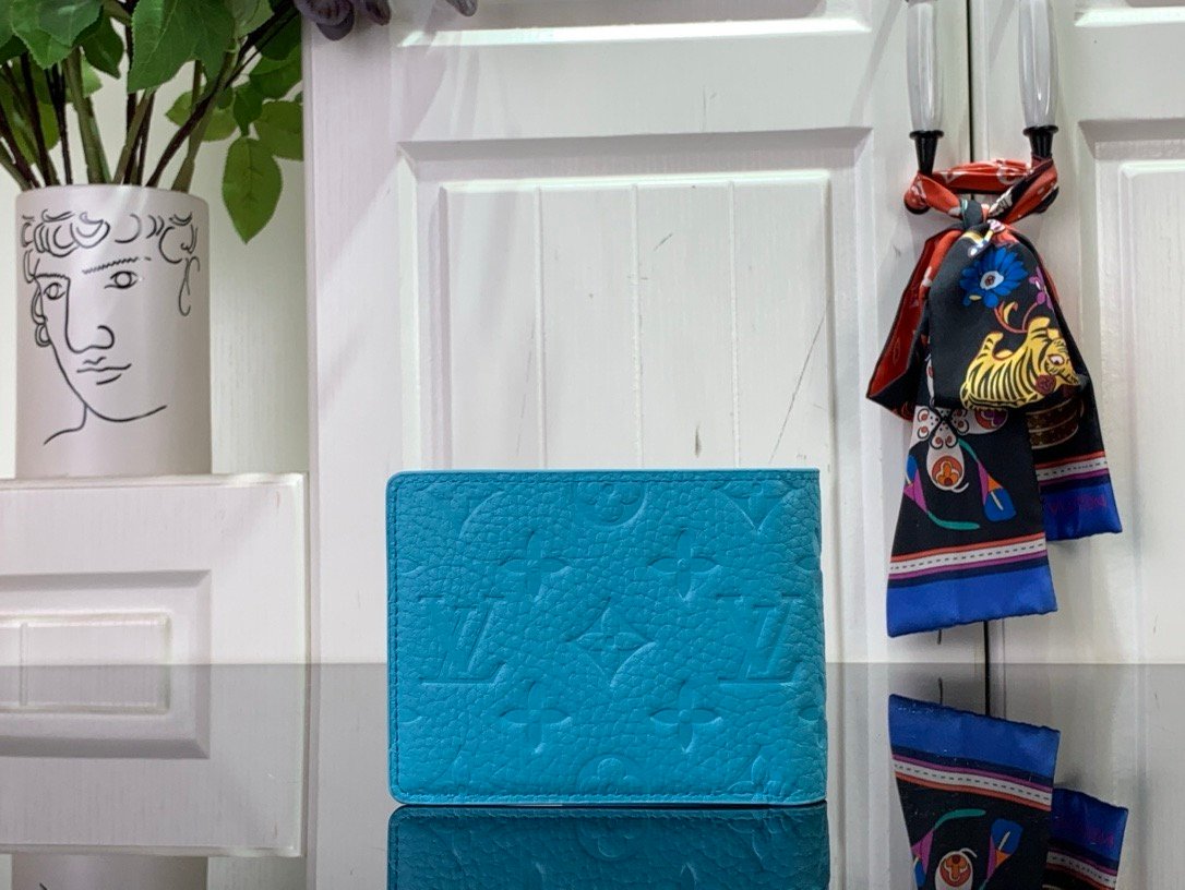 LV [Multiple short wallet] light blue (embossed)