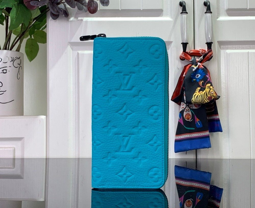LV light blue (embossed) zippy wallet card holder wallet