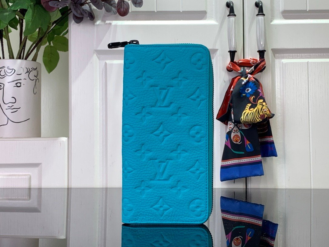 LV light blue (embossed) zippy wallet card holder wallet