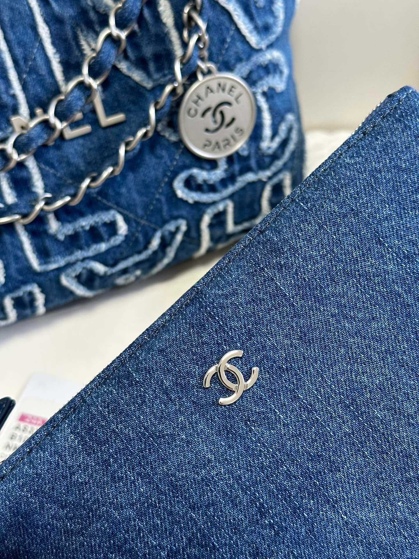 Chanel 24A 22Bag medium denim garbage bag AS3261W1080