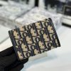 montaigne glycine wallet in blue oblique print fabric