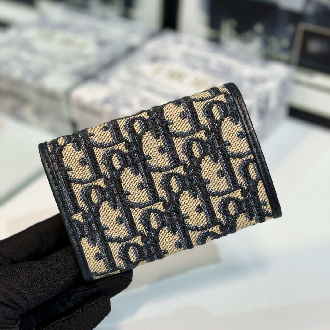 montaigne glycine wallet in blue oblique print fabric