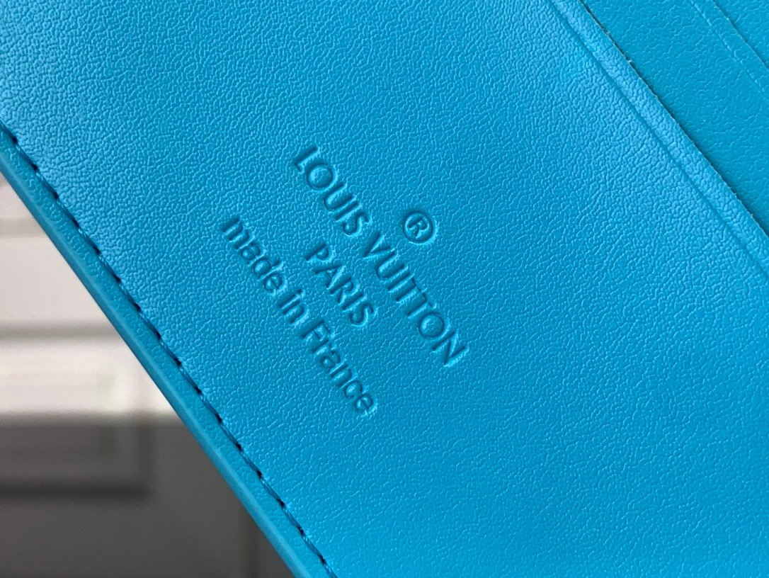LV [Multiple short wallet] light blue (embossed)