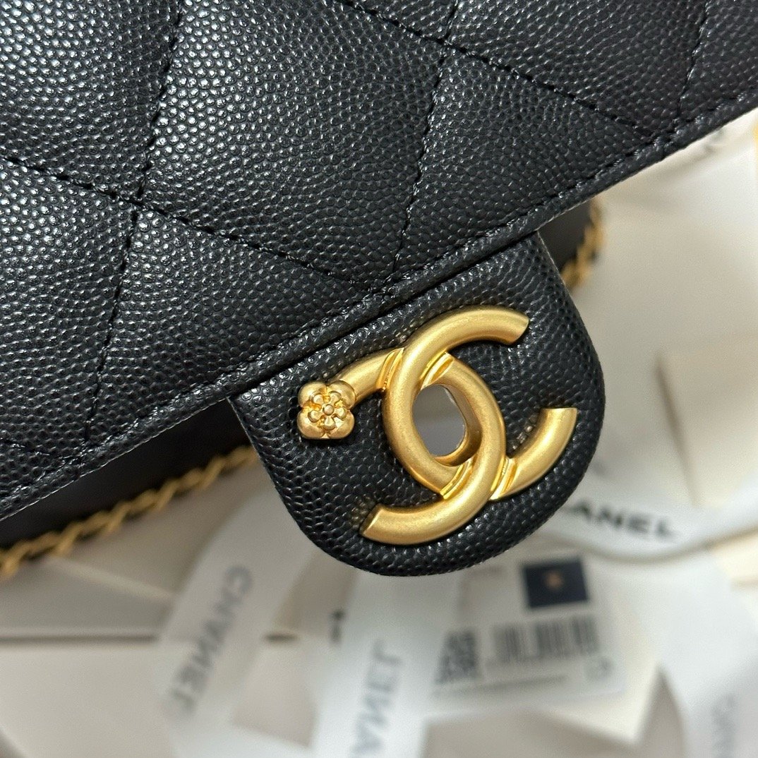 Chanel 23K litchi leather ball pattern chain backpack AS4490W1080