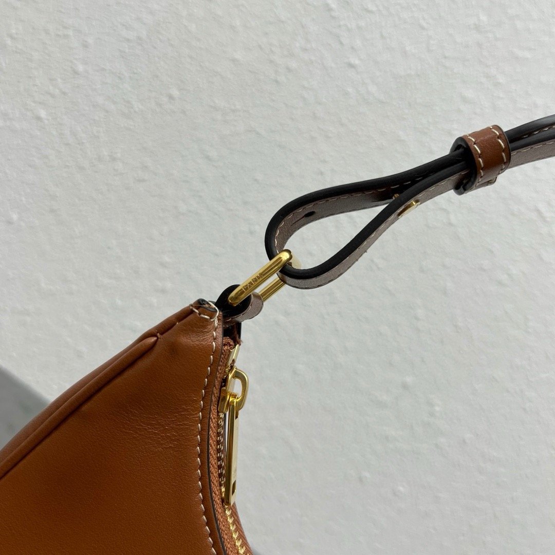 TRIOMPHE CANVAS AVA ARM BAG WITH LOGO PRINT