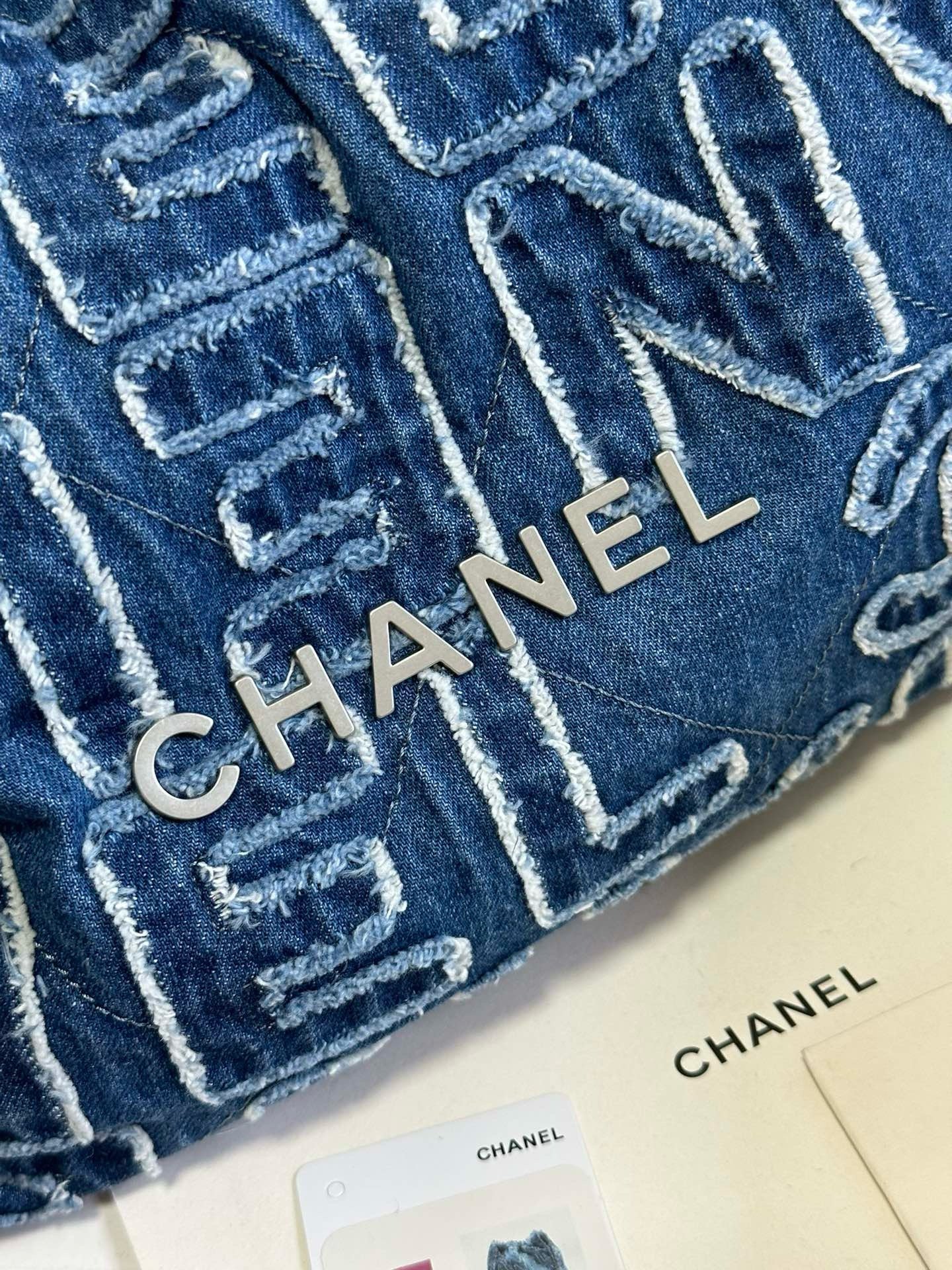 Chanel 24A 22Bag medium denim garbage bag AS3261W1080